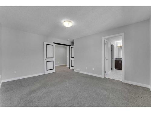 109 Kinniburgh Cove, Chestermere, AB - Indoor Photo Showing Other Room