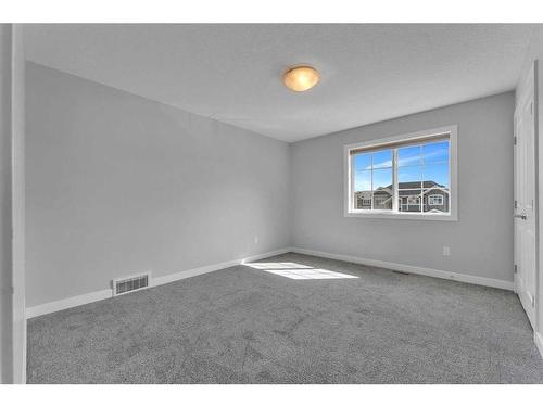 109 Kinniburgh Cove, Chestermere, AB - Indoor Photo Showing Other Room