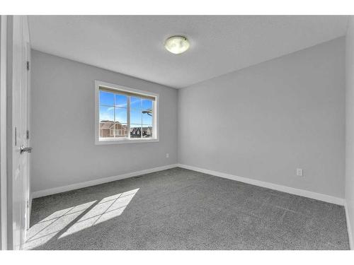 109 Kinniburgh Cove, Chestermere, AB - Indoor Photo Showing Other Room