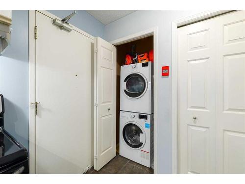 1-1928 26 Street Sw, Calgary, AB - Indoor Photo Showing Laundry Room