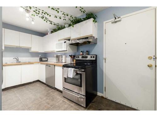 1-1928 26 Street Sw, Calgary, AB - Indoor Photo Showing Kitchen