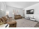 214 Silverado Skies Common Sw, Calgary, AB  - Indoor Photo Showing Living Room 