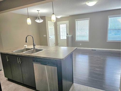 148 Cityscape Row Ne, Calgary, AB - Indoor Photo Showing Kitchen With Double Sink