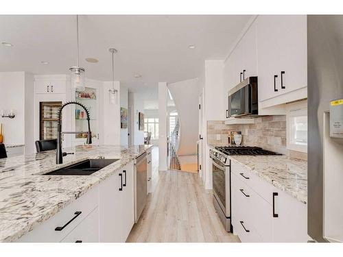 2045 49 Avenue Sw, Calgary, AB - Indoor Photo Showing Kitchen With Double Sink With Upgraded Kitchen