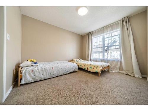 414 Cranford Court Se, Calgary, AB - Indoor Photo Showing Bedroom