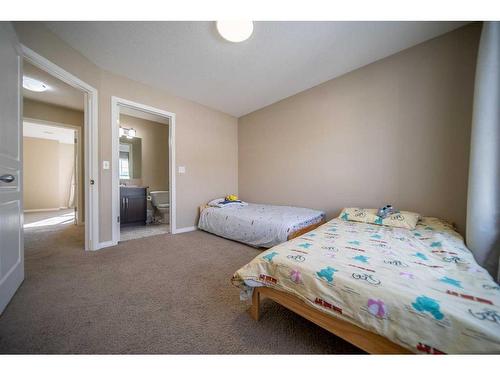 414 Cranford Court Se, Calgary, AB - Indoor Photo Showing Bedroom