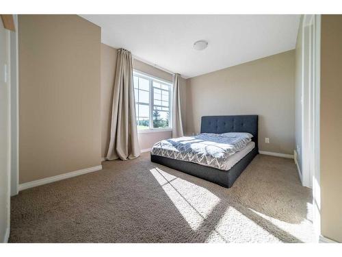 414 Cranford Court Se, Calgary, AB - Indoor Photo Showing Bedroom