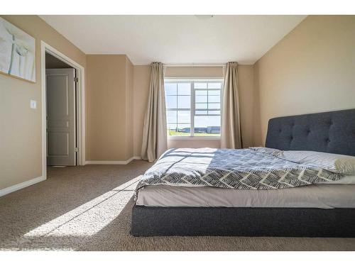 414 Cranford Court Se, Calgary, AB - Indoor Photo Showing Bedroom