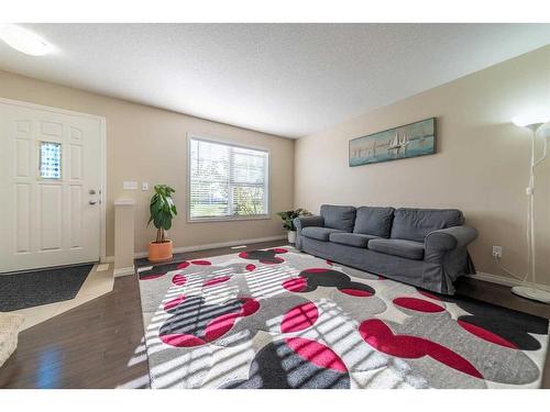 414 Cranford Court Se, Calgary, AB - Indoor Photo Showing Living Room