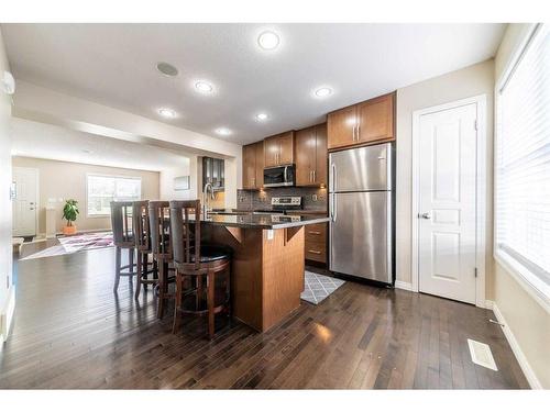 414 Cranford Court Se, Calgary, AB - Indoor Photo Showing Kitchen With Stainless Steel Kitchen