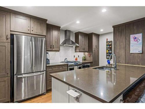 103-707 Spring Creek Drive, Canmore, AB - Indoor Photo Showing Kitchen With Upgraded Kitchen