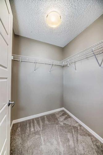 223 Panatella Walk Nw, Calgary, AB - Indoor With Storage