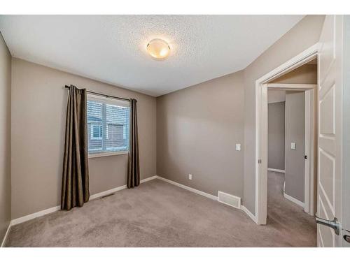 223 Panatella Walk Nw, Calgary, AB - Indoor Photo Showing Other Room