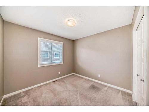 223 Panatella Walk Nw, Calgary, AB - Indoor Photo Showing Other Room