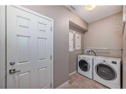 223 Panatella Walk Nw, Calgary, AB - Indoor Photo Showing Laundry Room