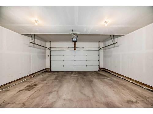 223 Panatella Walk Nw, Calgary, AB - Indoor Photo Showing Garage