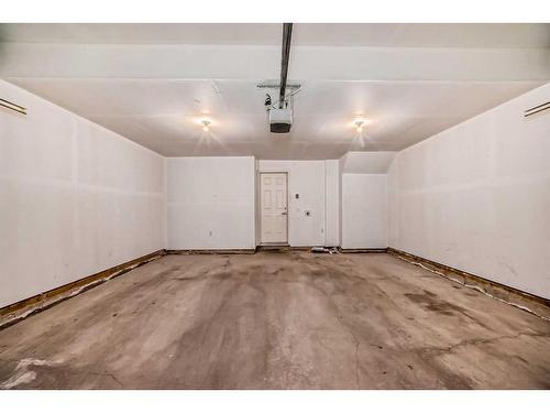 223 Panatella Walk Nw, Calgary, AB - Indoor Photo Showing Garage