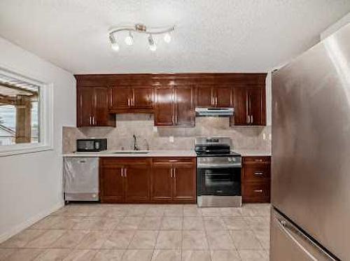 5020 Maryvale Drive Ne, Calgary, AB - Indoor Photo Showing Kitchen