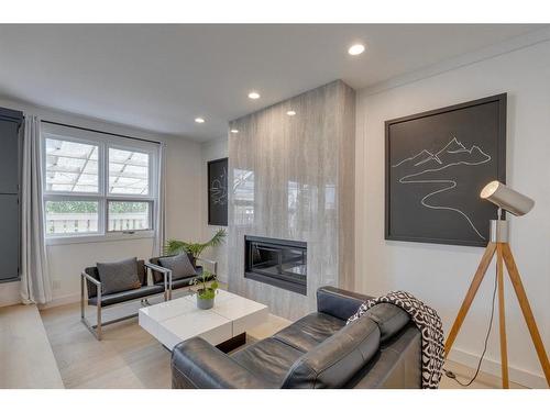 424 Berkley Crescent Nw, Calgary, AB - Indoor Photo Showing Living Room With Fireplace