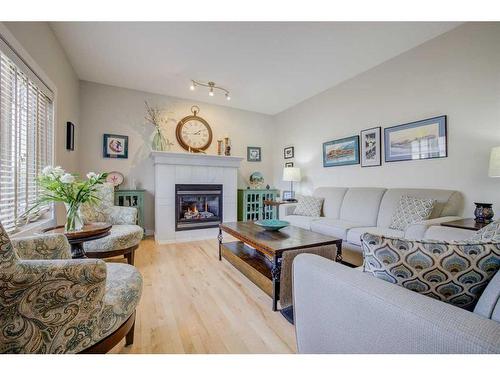 1622 Montrose Terrace Se, High River, AB - Indoor Photo Showing Living Room With Fireplace