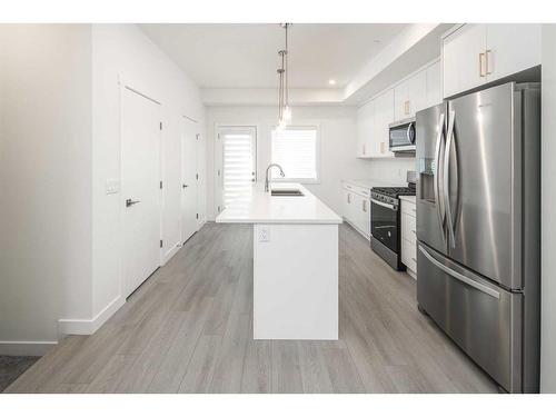 340 Sage Hill Circle Nw, Calgary, AB - Indoor Photo Showing Kitchen With Stainless Steel Kitchen With Double Sink With Upgraded Kitchen