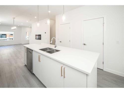 340 Sage Hill Circle Nw, Calgary, AB - Indoor Photo Showing Kitchen With Double Sink With Upgraded Kitchen