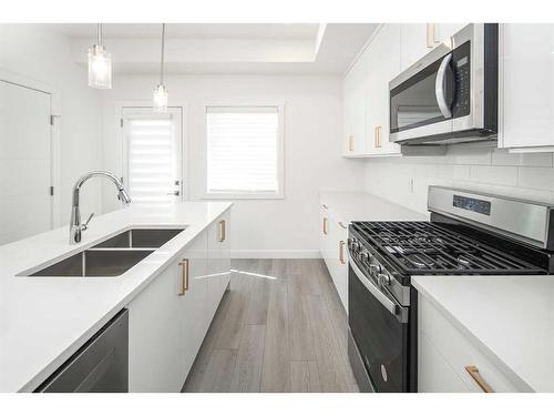 340 Sage Hill Circle Nw, Calgary, AB - Indoor Photo Showing Kitchen With Double Sink With Upgraded Kitchen