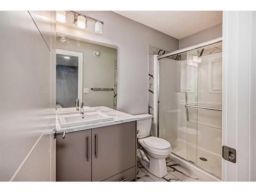 63 Wolf Creek Avenue Se, Calgary, AB - Indoor Photo Showing Bathroom