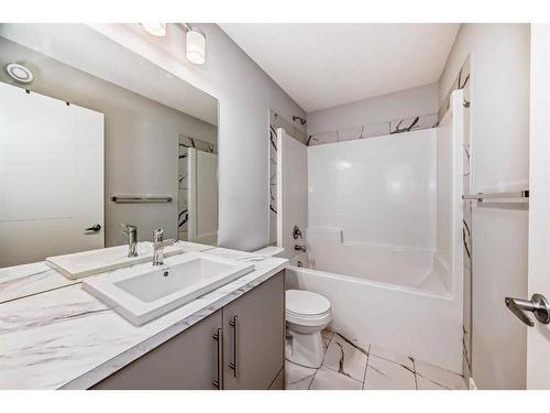 63 Wolf Creek Avenue Se, Calgary, AB - Indoor Photo Showing Bathroom