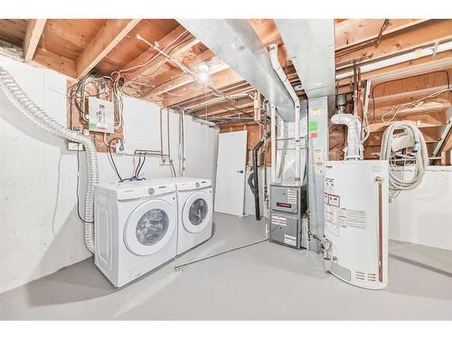 352 Queensland Drive Se, Calgary, AB - Indoor Photo Showing Laundry Room