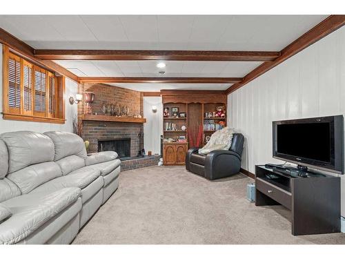 1123 14 Street Nw, Calgary, AB - Indoor Photo Showing Other Room With Fireplace