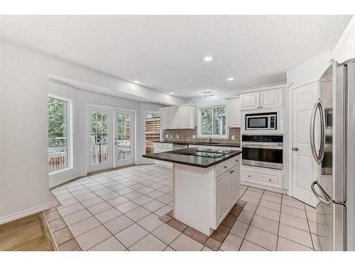 107 Douglasview Bay Se, Calgary, AB - Indoor Photo Showing Kitchen With Stainless Steel Kitchen