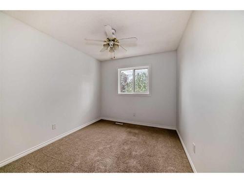 107 Douglasview Bay Se, Calgary, AB - Indoor Photo Showing Other Room