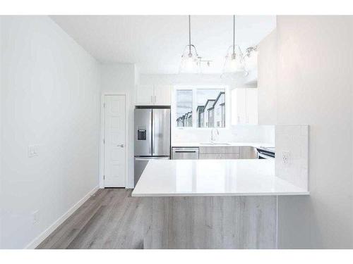 363-301 Redstone Boulevard Ne, Calgary, AB - Indoor Photo Showing Kitchen With Upgraded Kitchen