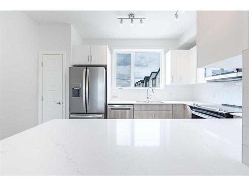 363-301 Redstone Boulevard Ne, Calgary, AB - Indoor Photo Showing Kitchen With Stainless Steel Kitchen With Upgraded Kitchen