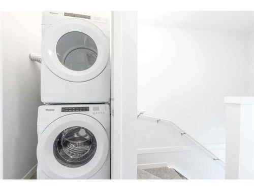 363-301 Redstone Boulevard Ne, Calgary, AB - Indoor Photo Showing Laundry Room