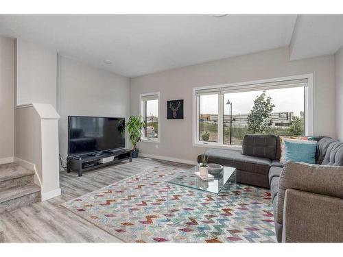 1865 Na'A Drive Sw, Calgary, AB - Indoor Photo Showing Living Room