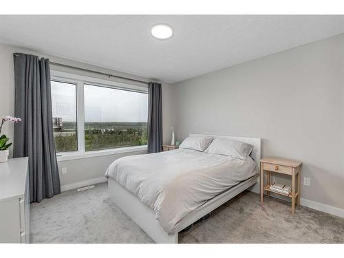 1865 Na'A Drive Sw, Calgary, AB - Indoor Photo Showing Bedroom