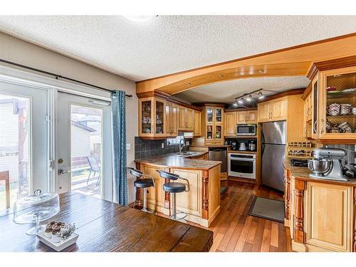 25 Saddlefield Crescent Ne, Calgary, AB - Indoor Photo Showing Kitchen With Double Sink