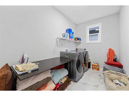 322 Edith Road Nw, Calgary, AB - Indoor Photo Showing Laundry Room