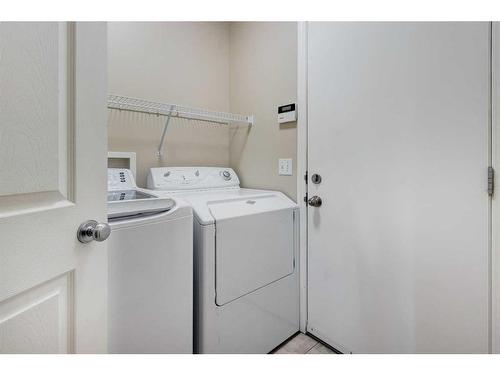 306 Rockyspring Circle Nw, Calgary, AB - Indoor Photo Showing Laundry Room