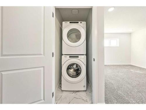 93 Setonstone Green Se, Calgary, AB - Indoor Photo Showing Laundry Room