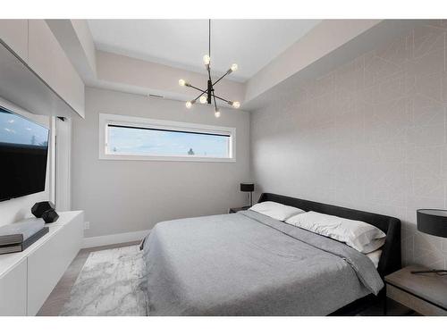 411-3375 15 Street Sw, Calgary, AB - Indoor Photo Showing Bedroom