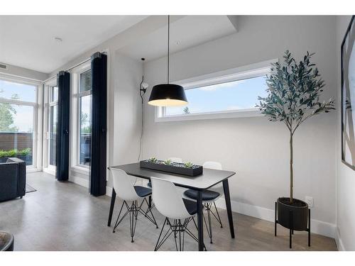 411-3375 15 Street Sw, Calgary, AB - Indoor Photo Showing Dining Room