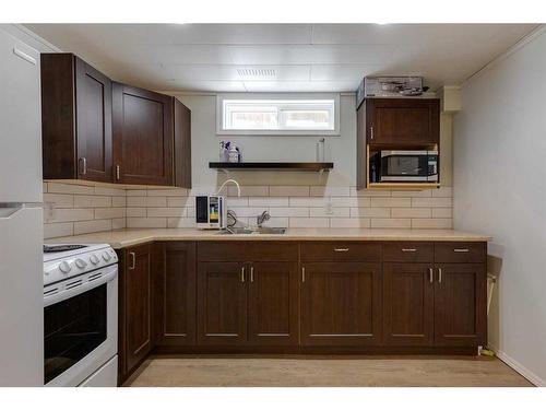 23 & 25 Creston Crescent Nw, Calgary, AB - Indoor Photo Showing Kitchen