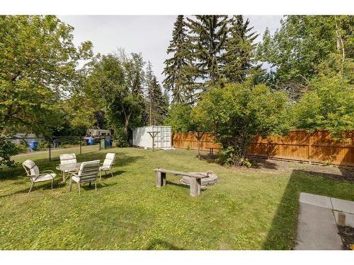 23 & 25 Creston Crescent Nw, Calgary, AB - Outdoor With Backyard