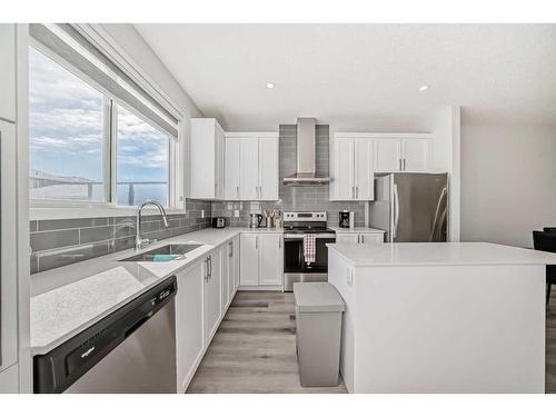 20 Creekstone Drive Sw, Calgary, AB - Indoor Photo Showing Kitchen With Stainless Steel Kitchen With Double Sink With Upgraded Kitchen