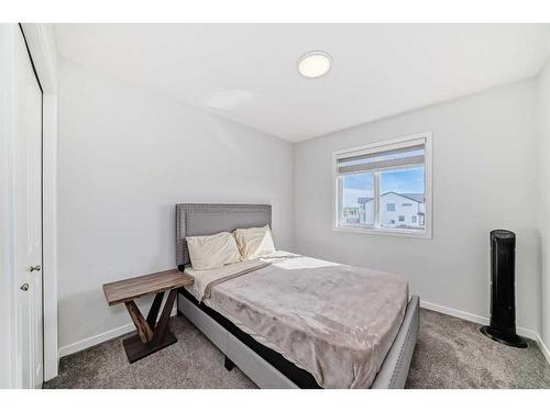 20 Creekstone Drive Sw, Calgary, AB - Indoor Photo Showing Bedroom