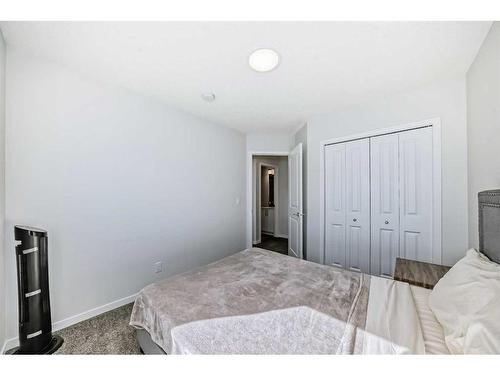 20 Creekstone Drive Sw, Calgary, AB - Indoor Photo Showing Bedroom