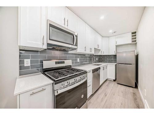 20 Creekstone Drive Sw, Calgary, AB - Indoor Photo Showing Kitchen With Stainless Steel Kitchen With Upgraded Kitchen